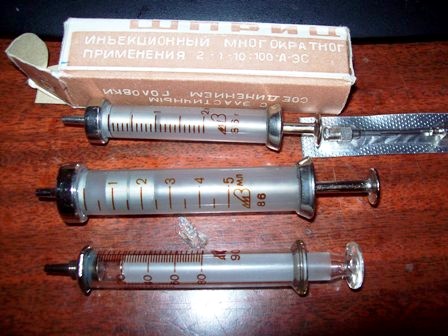 Glass and stainless steel syringe